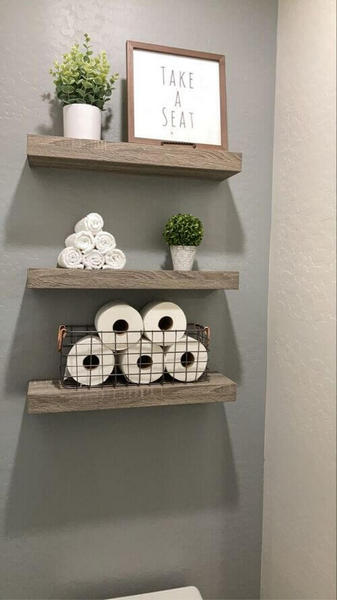 decoration salle de bains au dessus des toilettes