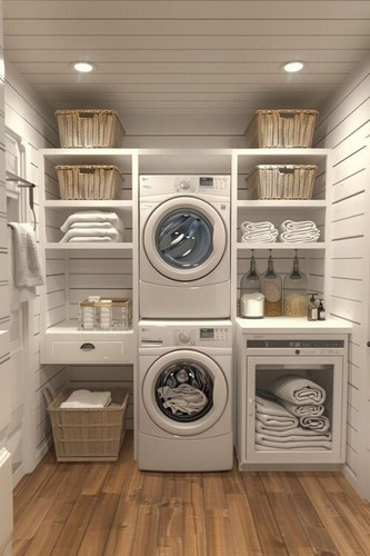 buanderie avec lave-linge et sèche-linge superposés